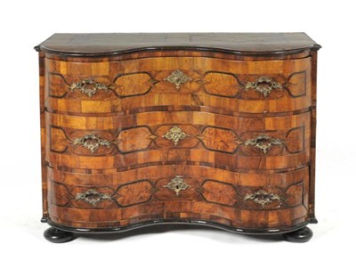 Lot 1315 - A Mid 18th Century German Walnut, Burr Poplar and Parquetry Serpentine Commode, inlaid with...