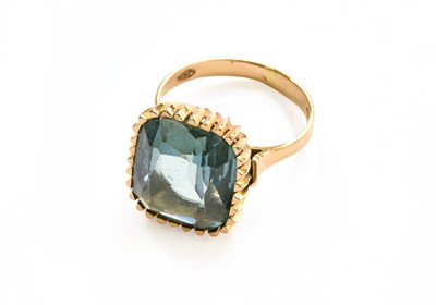 Lot 123 - A Green Synthetic Spinel Ring, indistinctly...