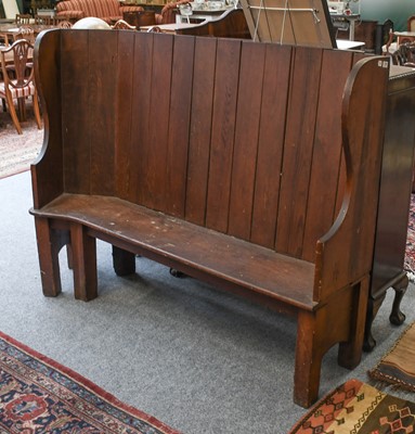 Lot 1268 - A Pitch Pine Settle, 173cm by 55cm by 130cm