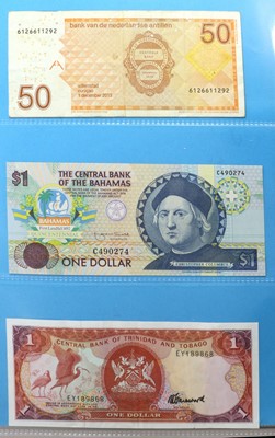 Lot 584 - World Banknotes, a collection in 7 x volumes,...