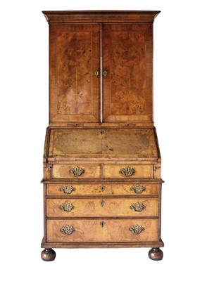 Lot 486 - A George I Walnut and Feather-Banded Bureau...