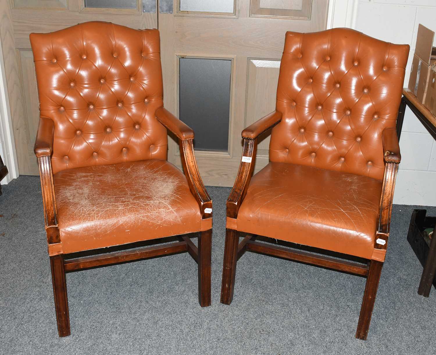 Lot 1149 Two Buttoned Leather Library Chairs lot-1149-two-buttoned-leather-library-chairs