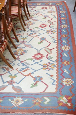 Lot 1201 - A Large Flatwoven Carpet, the cream lattice...