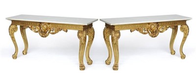 Lot 1318 - A Pair of Gilt and Gesso Console Tables, in George II Irish style, of recent date, with grey...