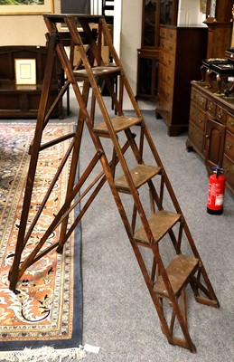 Lot 1223 - A Set of Folding Oak Ladders, bearing patent...