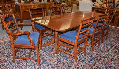 Lot 1192 - A Reproduction Mahogany Twin Pillar Dining...