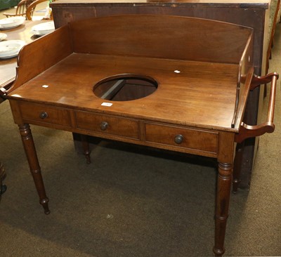 Lot 1364 - A Victorian Mahogany Washstand, raised on ring-...