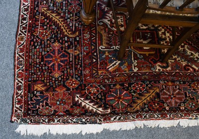 Lot 1221 - Large Heriz Carpet, circa 1920, the burgundy...