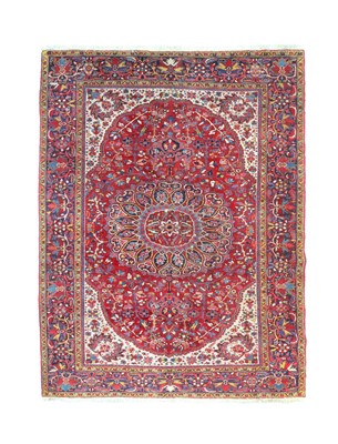 Lot 549 - Heriz Carpet North West Persia, circa 1940 The...