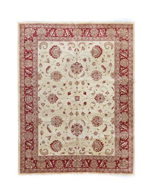 Lot 519 - Afghan Ziegler Carpet, modern The ivory ground...