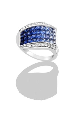 Lot 2265 - A Sapphire and Diamond Ring four rows of...