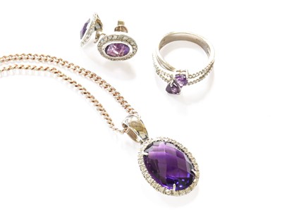 Lot 140 - An Amethyst and White Stone Pendant on Chain,...