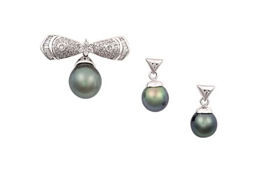 Lot 2326 - A Tahitian Cultured Pearl and Diamond Brooch...