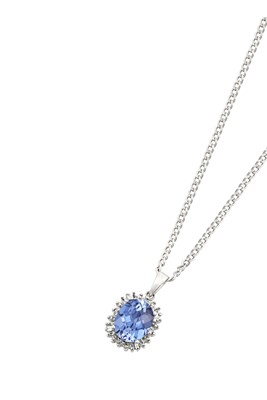 Lot 2269 - A Synthetic Sapphire and Diamond Pendant on...