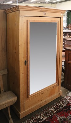 Lot 1327 - A Pine Single Door Mirror-Fronted Wardrobe,...