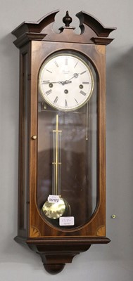 Lot 1384 - A Modern Chiming Wallclock, signed Comitti,...