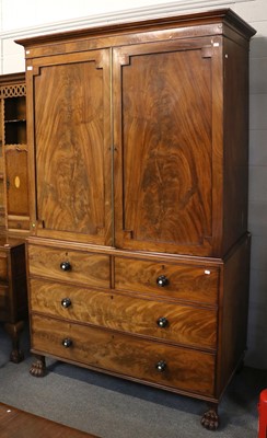 Lot 1298 - A George III Mahogany Press Cupboard, fitted...