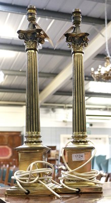 Lot 1124 - A Pair of Brass Corinthian Columnar Table...