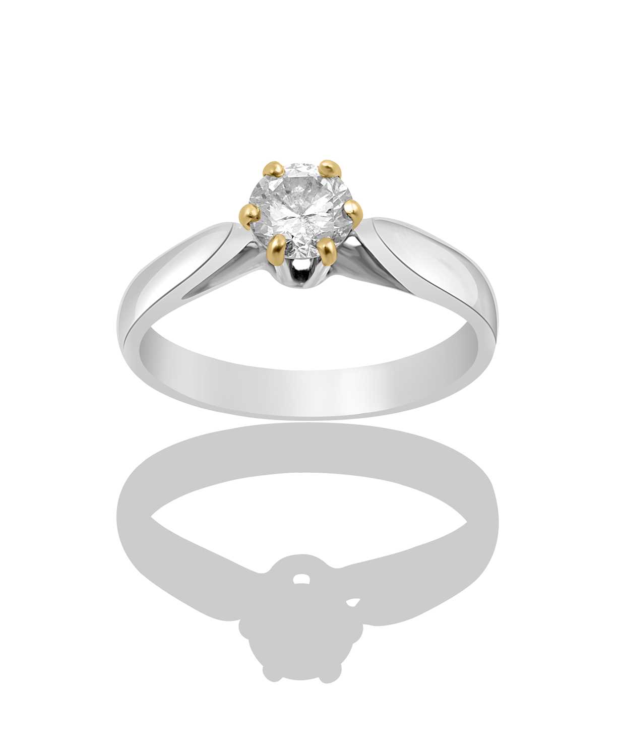 Lot 119 - An 18 Carat White Gold Diamond Solitaire Ring,...