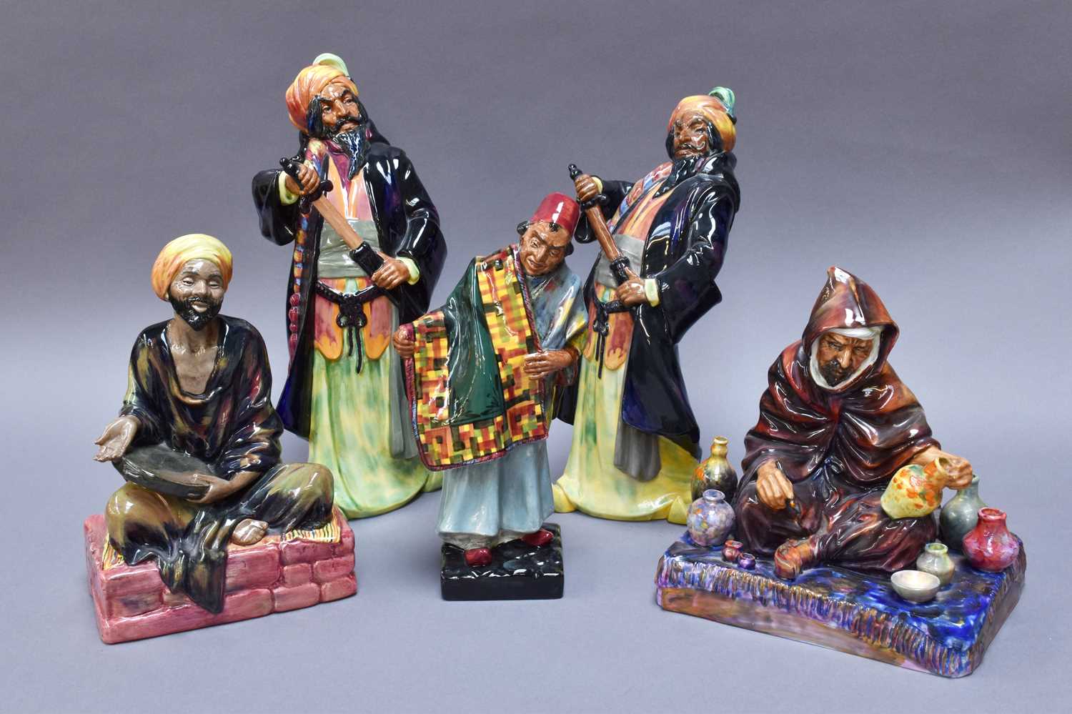 Lot 252 - Five Royal Doulton Figures, 'Mendicant' HN1365,...