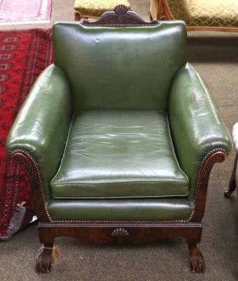 Lot 1370 - A 1920's Green Leather Club Chair, on carved...