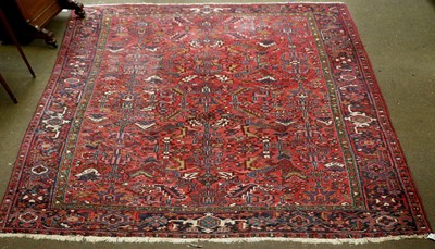 Lot 1200 - A Heriz Carpet, the raspberry field with an...