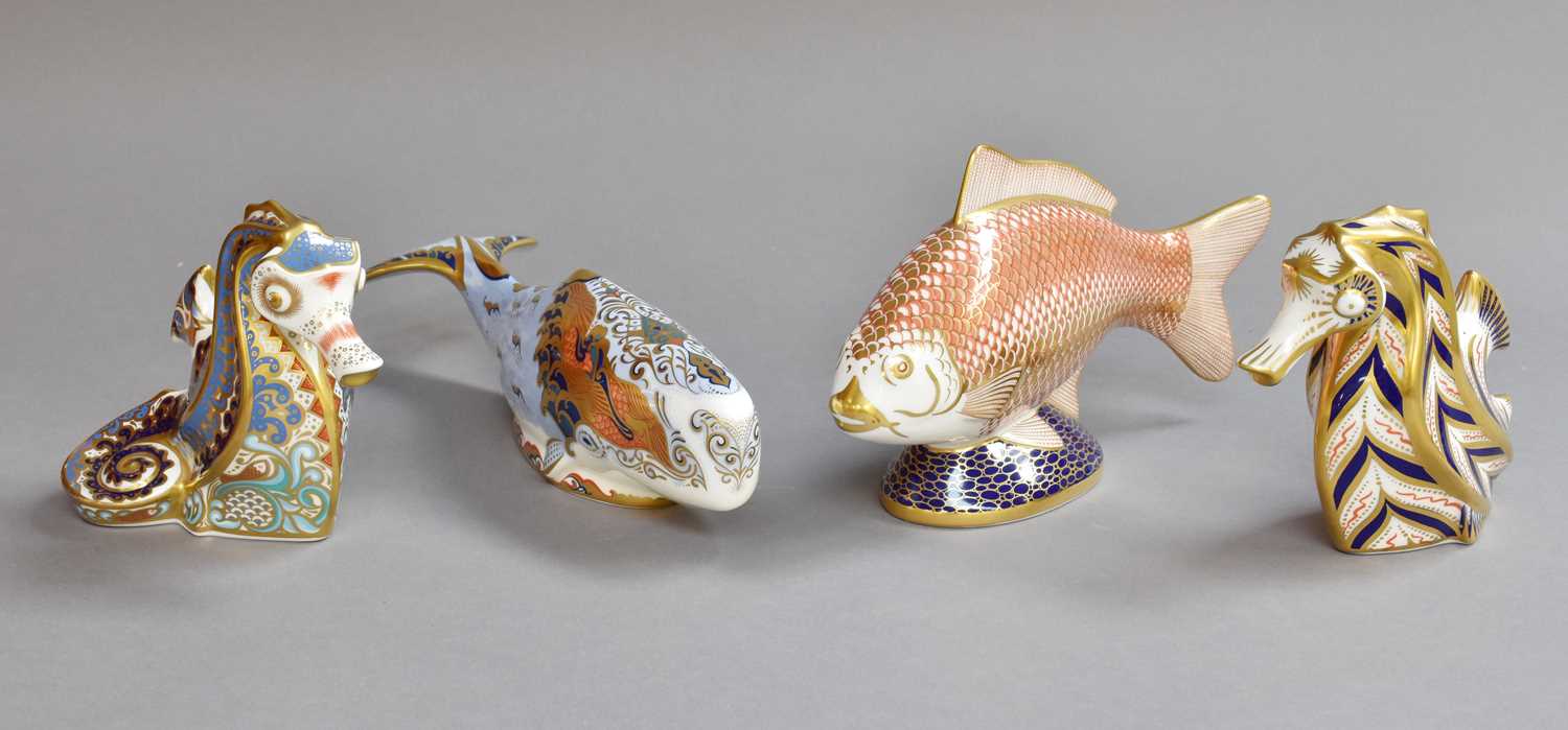 Lot 343 - Four Royal Crown Derby Imari Paperweights,...