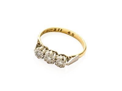Lot 25 - A Diamond Three Stone Ring, stamped ‘18CT’,...