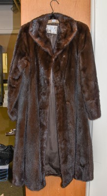 Lot 234 - A Dark Brown Mink Coat, three-quarter length,...