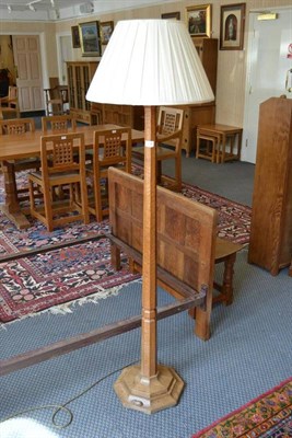 Lot 941A - A Robert "Mouseman" Thompson Oak Standard Lamp, octagonal column and base, with carved mouse...