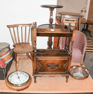 Lot 1177 - An Oak Book Rack, Lloyd Loom style child's...