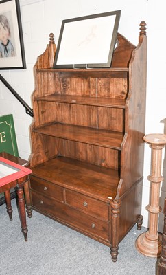 Lot 1256 - A Modern Hardwood Waterfall Bookcase, with...