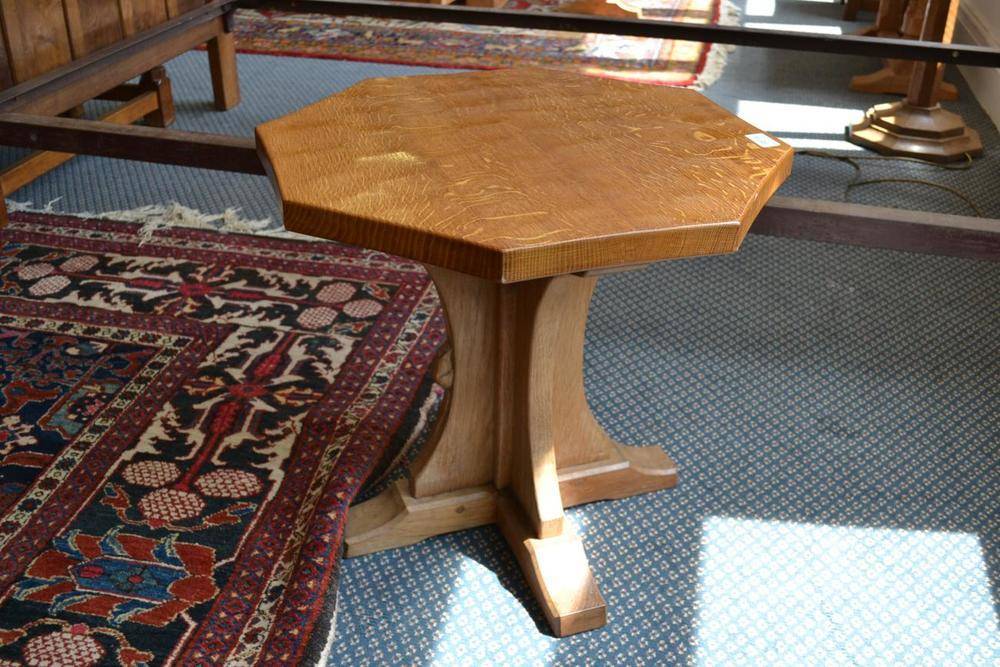 Lot 951 - A Robert "Mouseman" Thompson Oak Octagonal Coffee Table, on a cruciform base, with carved mouse...