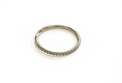 Lot 227 - A Platinum Diamond Half Hoop Ring, finger size P