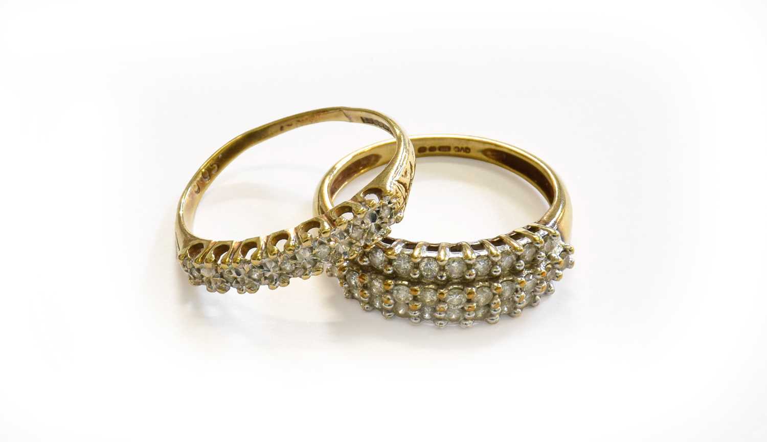 Lot 234 - Two 9 Carat Gold Diamond Half Hoop Rings,...