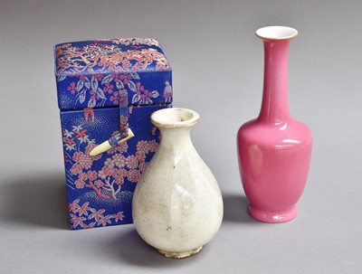 Lot 351 - A Chinese Pink Glazed Bottle Vase, with red...