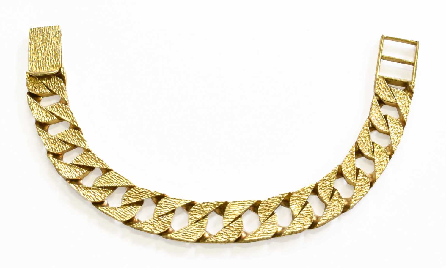 Lot 251 - A 9 Carat Gold Textured Curb Link Bracelet,...