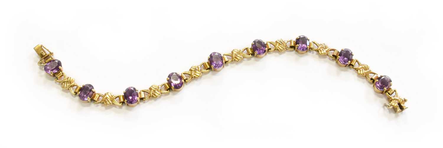 Lot 226 - A 9 Carat Gold Amethyst Fancy Link Bracelet,...