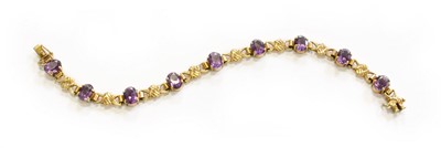 Lot 226 - A 9 Carat Gold Amethyst Fancy Link Bracelet,...