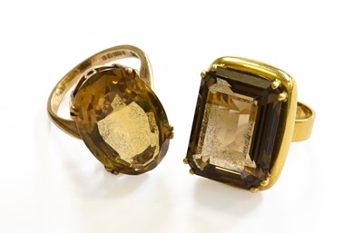Lot 235 - A 9 Carat Gold Smoky Quartz Ring, finger size...