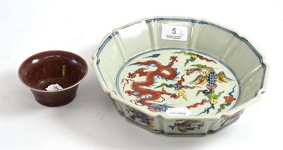 Lot 5 - A Chinese dragon decorated bowl and a small Chinese tea bowl