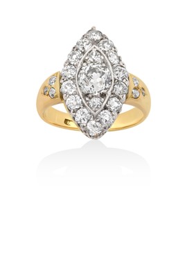 Lot 2008 - A Diamond Cluster Ring the navette shaped...