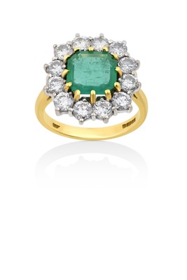 Lot 2065 - An 18 Carat Gold Emerald and Diamond Cluster...