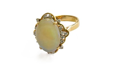 Lot 215 - An Opal and Diamond Cluster Ring, stamped '14K'...