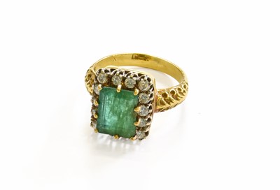 Lot 224 - An Emerald and Diamond Cluster Ring, stamped...