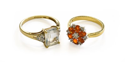 Lot 242 - A 9 Carat Gold Aquamarine and Diamond Ring,...
