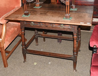 Lot 1395 - An 18th Century Oak Single Drawer Side...