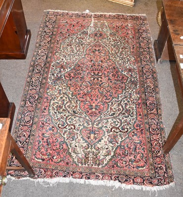 Lot 1205 - A Saroukh Rug, the ivory ground of vines...