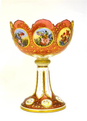 Lot 2 - A Bohemian White and Ruby Glass Overlay Pedestal Bowl, circa 1875, with deeply cut bracketed...