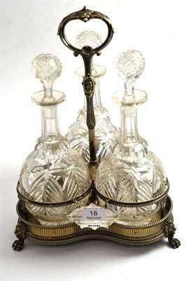 Lot 18 - Plated three bottle decanter stand with silver inscription plate and three glass decanters and...